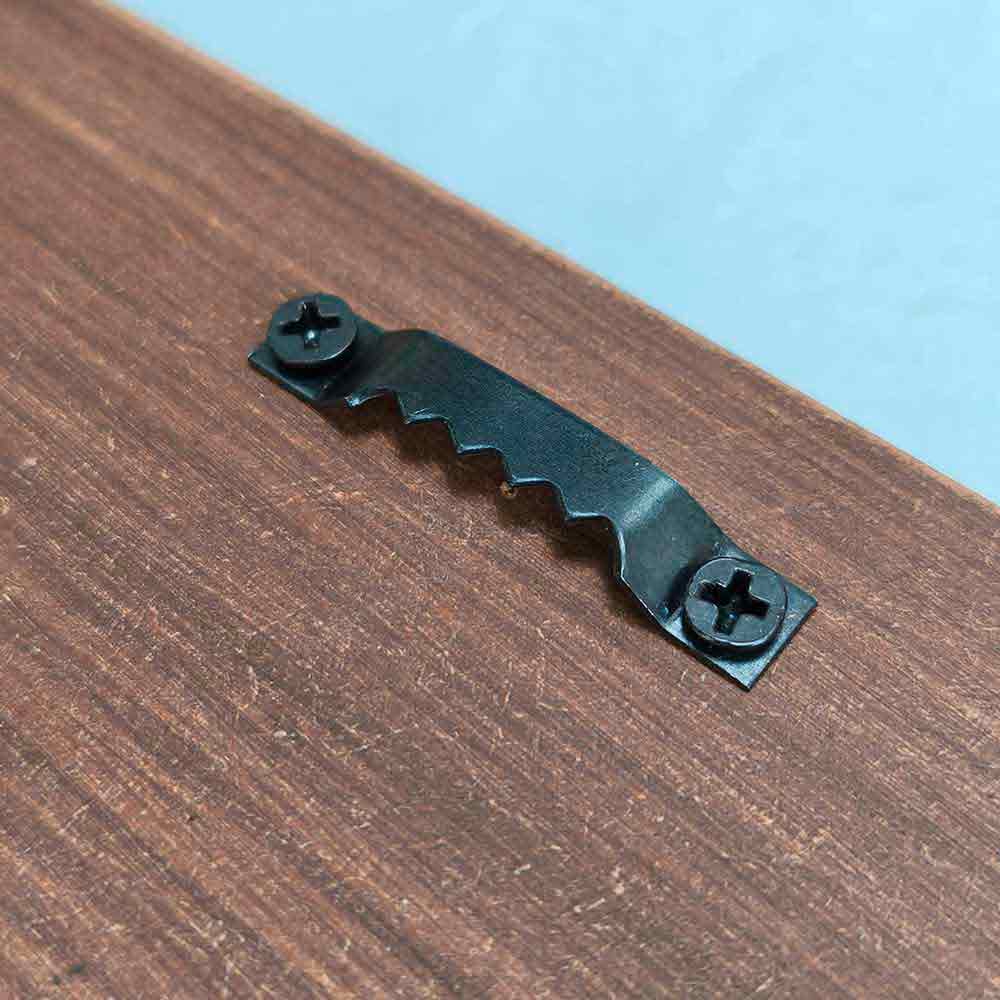 Atari retro gaming logo vintage wooden sign handmade on 18mm MDF with bold black Atari Fuji symbol on heavily distressed multi-layered paint background freestanding on white surface