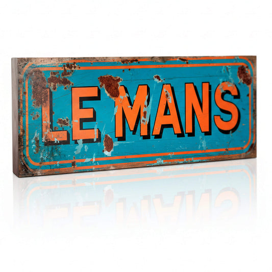 A new handmade racing sign with a Gulf blue background and orange "LE MANS" text. The sign features faux-distressing, including realistic rust patches and weathered surface effects.