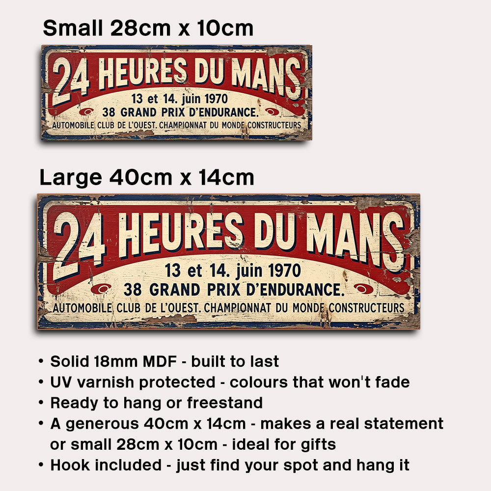 A product listing graphic showing two vintage-style racing sign sizes with text labels: Small 28cm x 10cm and Large 40cm x 14cm. The signs read “24 HEURES DU MANS” with race details and a hanging hook note below on a light gray background.