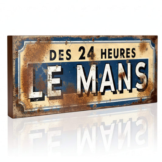 A new rectangular racing sign with a cream and blue background. The text "DES 24 HEURES LE MANS" is shown with heavy faux-rust patches and weathered edges.