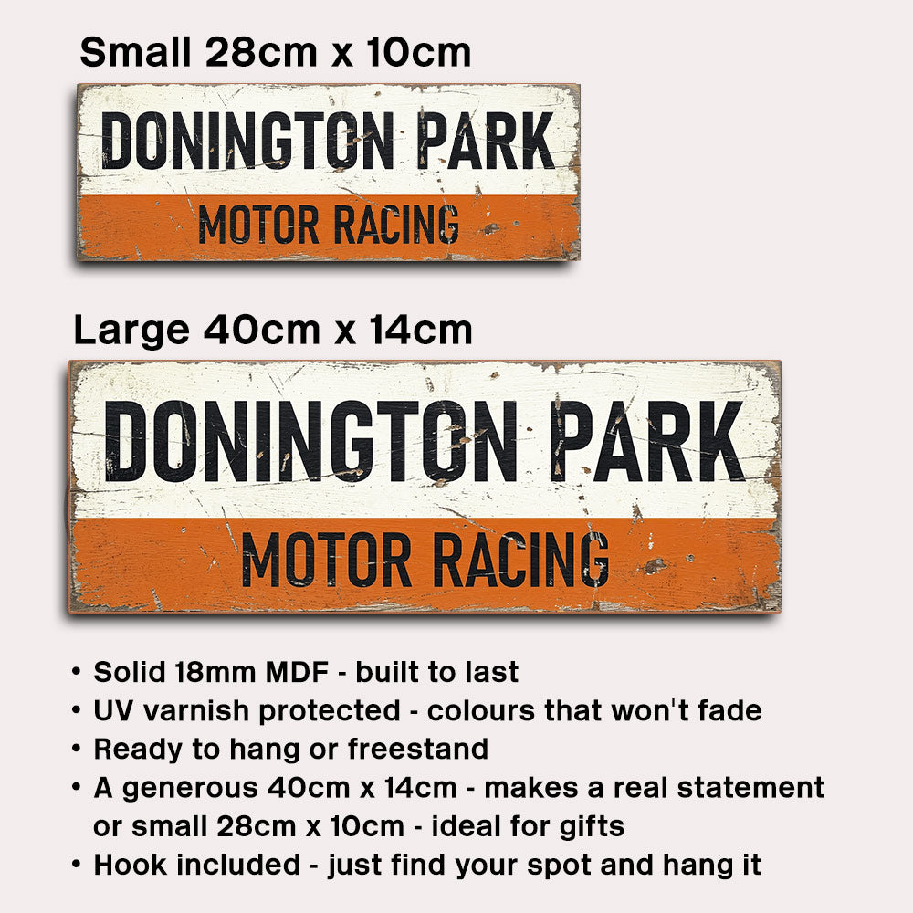 Two distressed metal-style signs reading "DONINGTON PARK MOTOR RACING" shown in small 28cm x 10cm and large 40cm x 14cm sizes, with bullet points describing the signs' features on a light gray background.