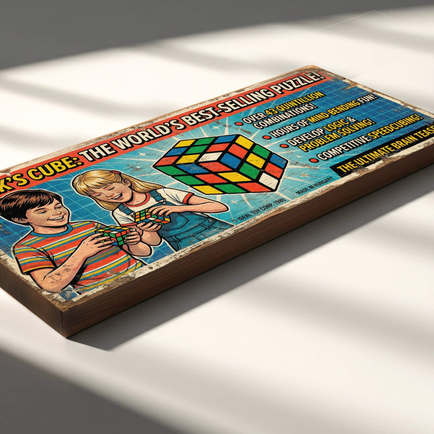 Rubik's Cube retro vintage toy advert wooden sign handmade on 18mm MDF with colourful distressed finish, freestanding on a light wood shelf